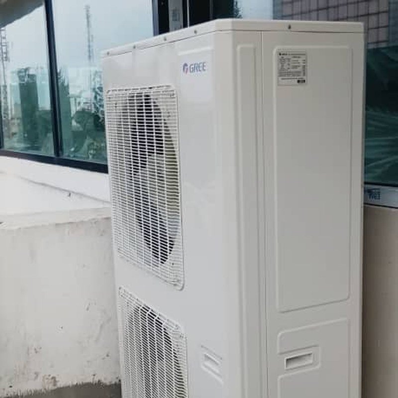 Newly installed GREE VRF outdoor unit mounted on a fabricated steel stand